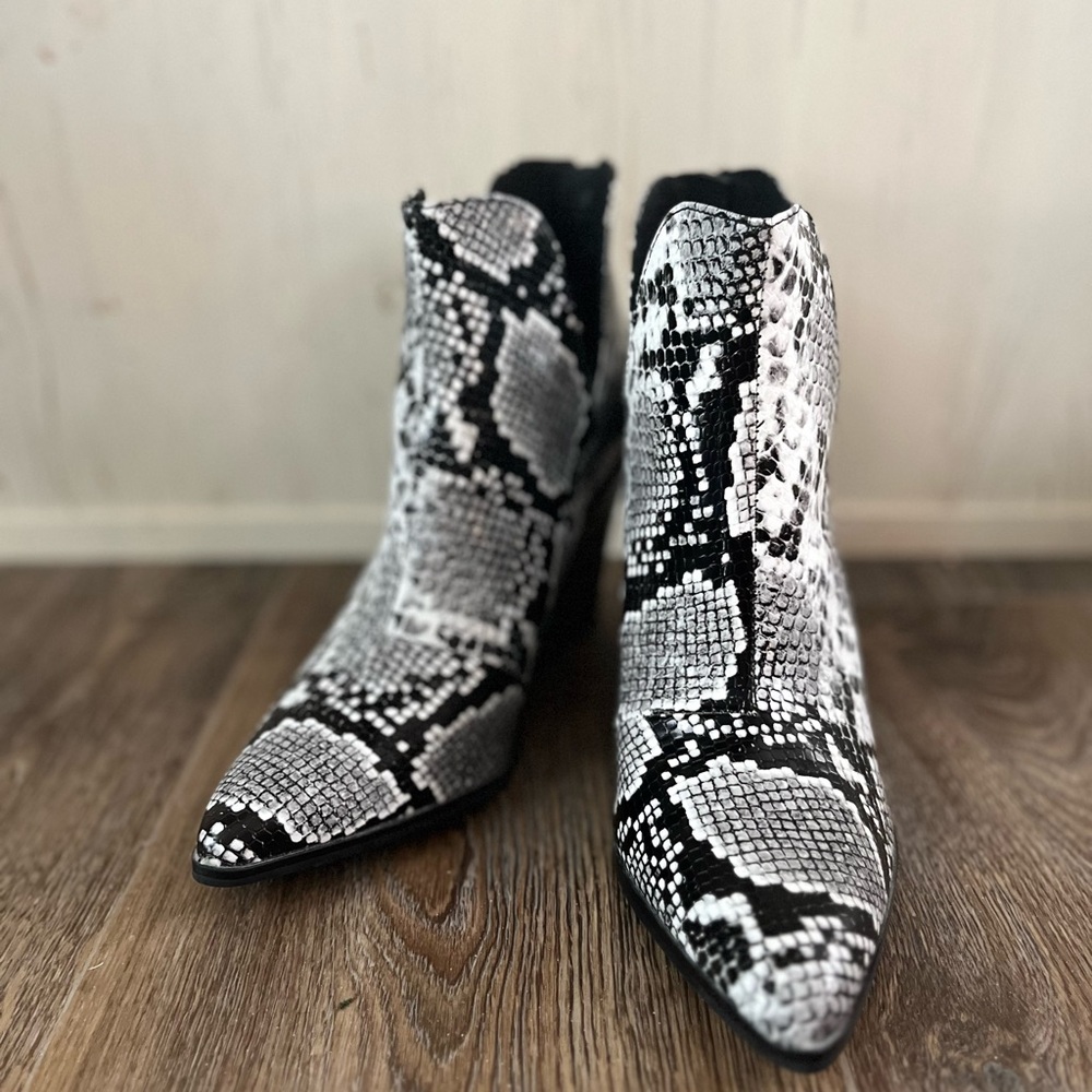 Snake skin heeled boots